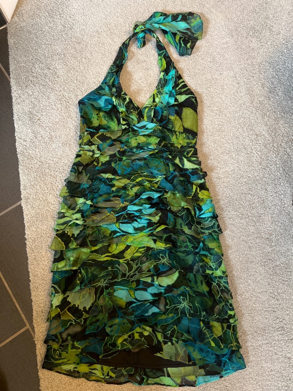 Jones New York gauzy halter dress in green, blue and black.